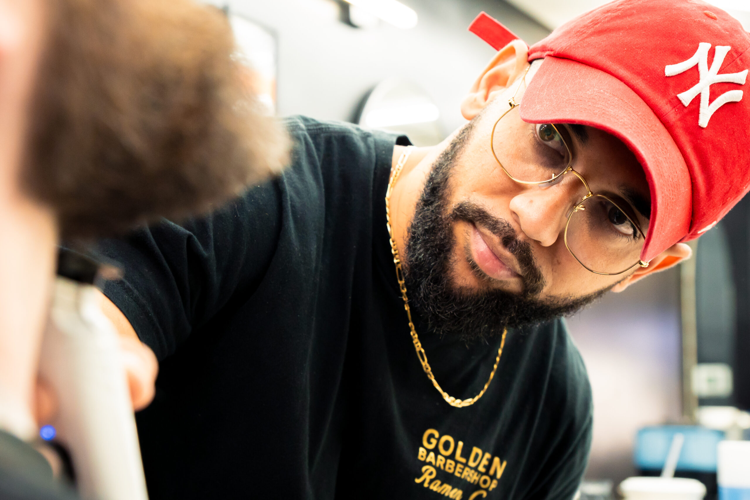 Ramon, owner and master barber at Golden Barbershop.